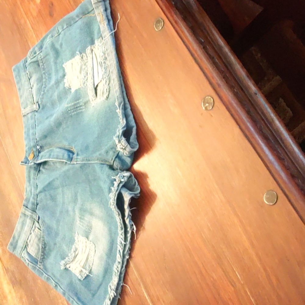 Distressed light blue denim shorts never worn